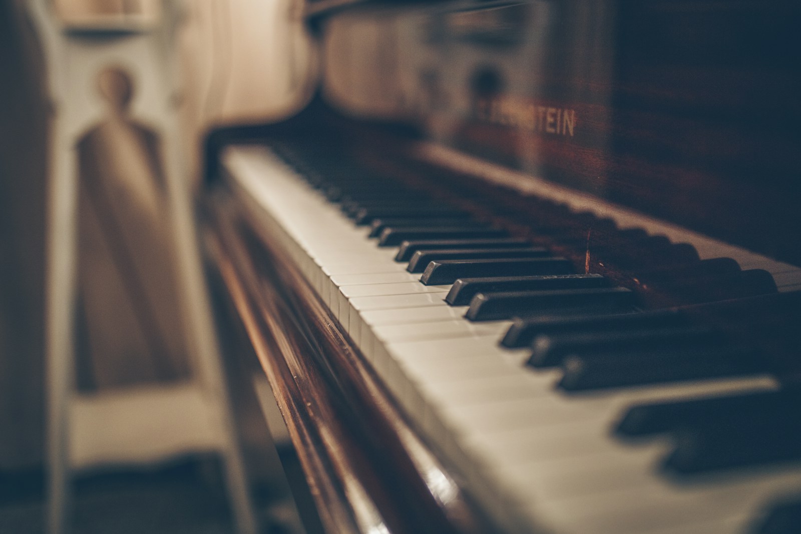 Close view of acoustic piano keys